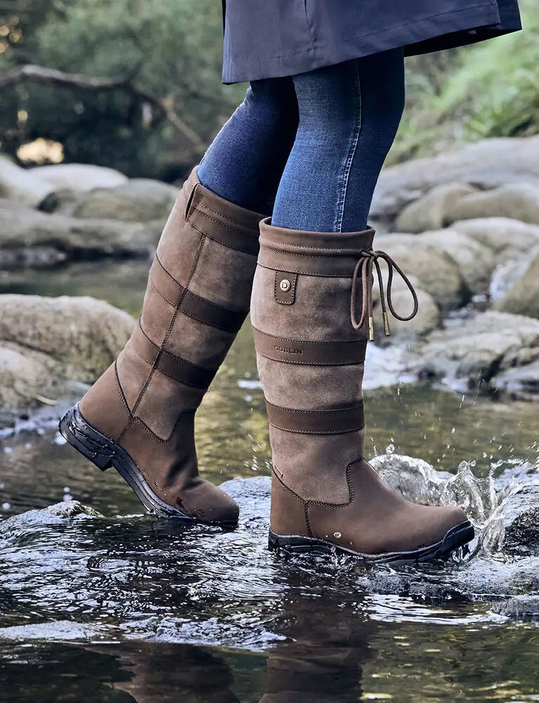 1026061000-CHOCOLATE_DB-River-Boots-lifestyle5_Image_Null_Hero.webp