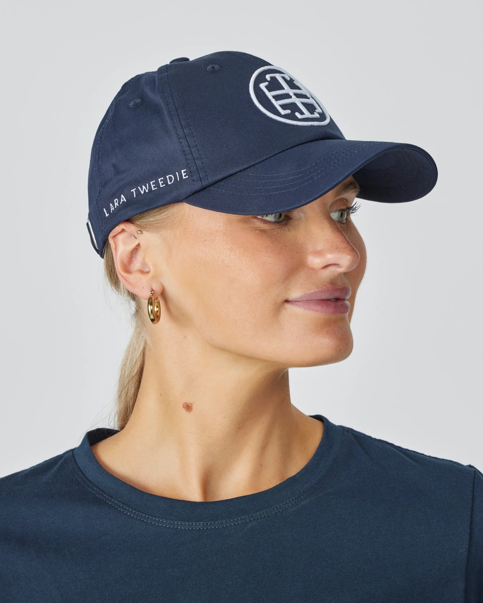LaraTweedieLogoCapNavy_White.5.webp