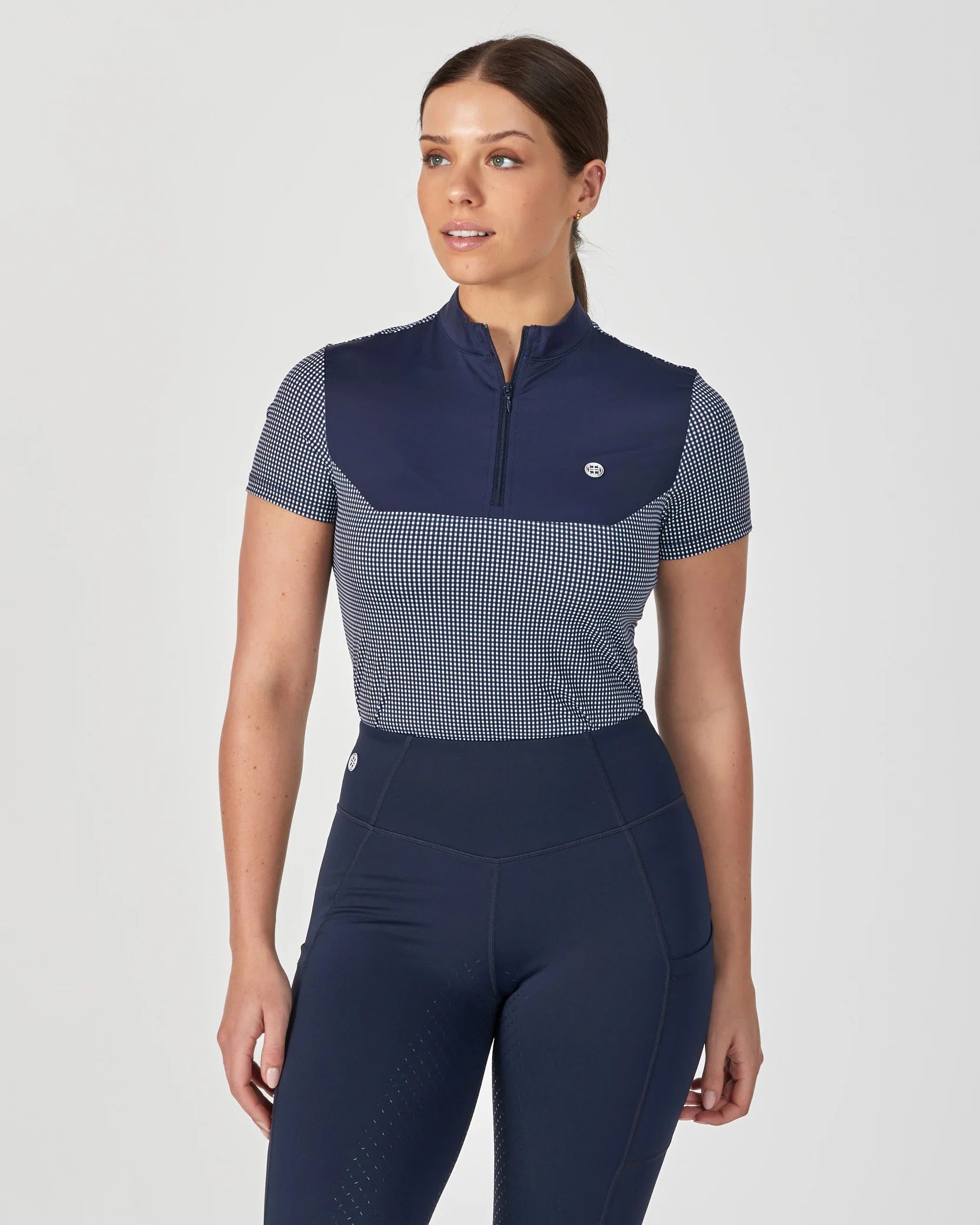 LaraTweedieMiniCheckShortSleeveTrainingop.1.webp
